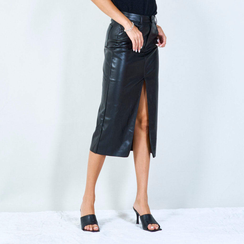 Shop the look: (1) Elegant midi faux leather skirt AND (2) Ruffled layered tank top AND (3) Trendy black crossbody handbag