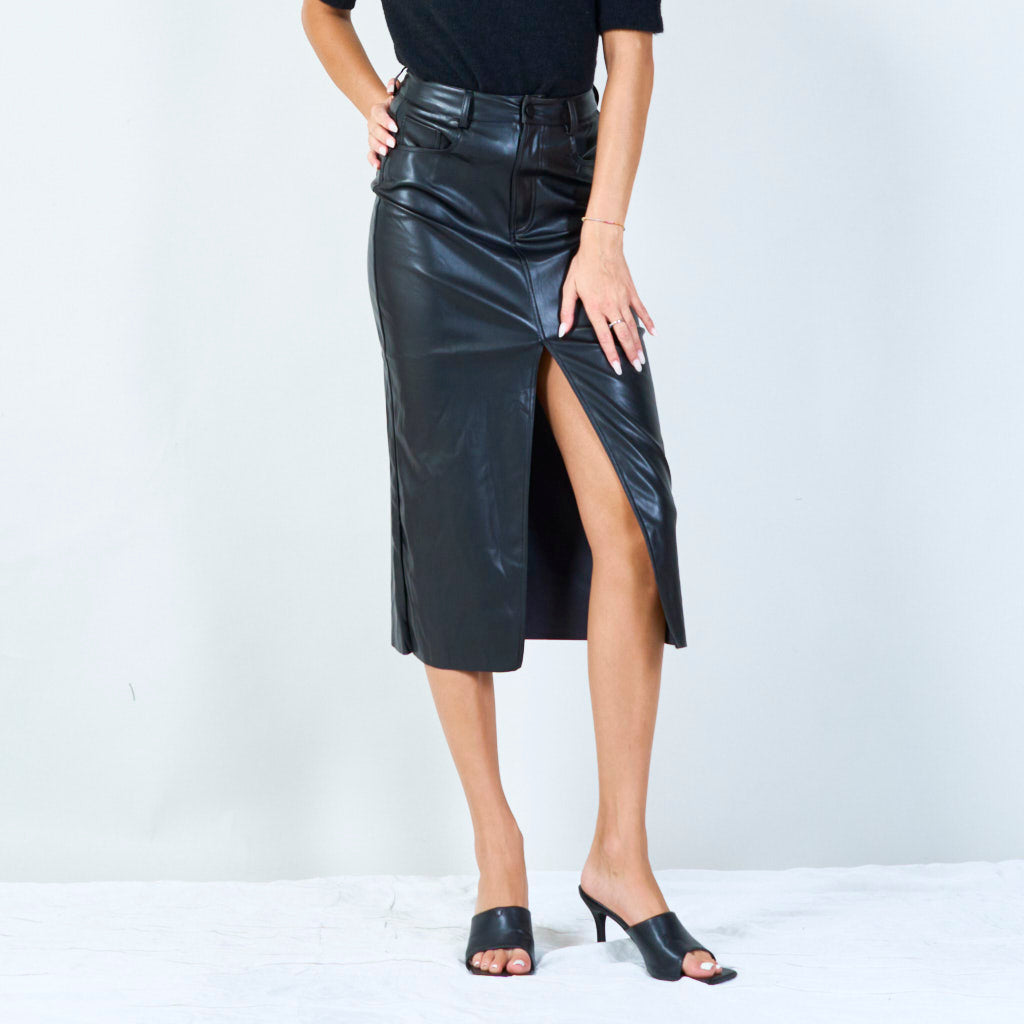 Shop the look: (1) Elegant midi faux leather skirt AND (2) Ruffled layered tank top AND (3) Trendy black crossbody handbag